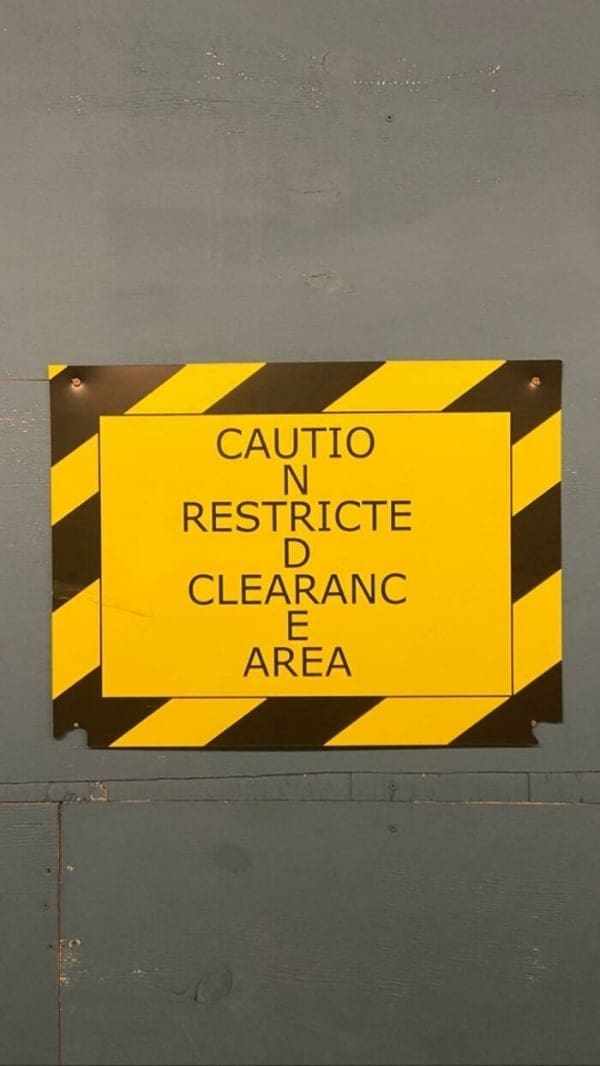 bad designs CAUTIO N RESTRICTE D CLEARANC E AREA