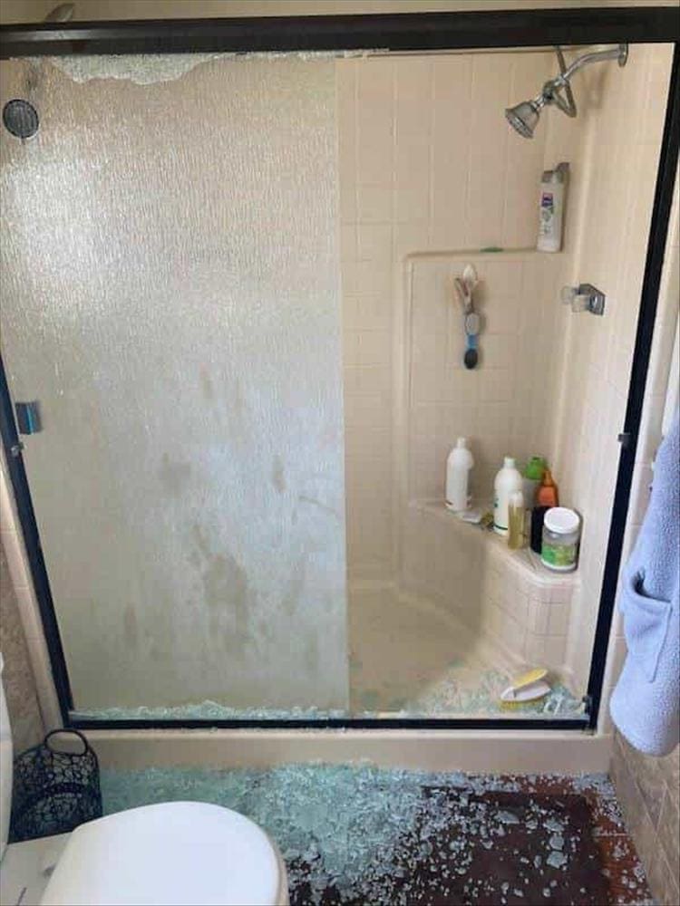 smashed shower glass