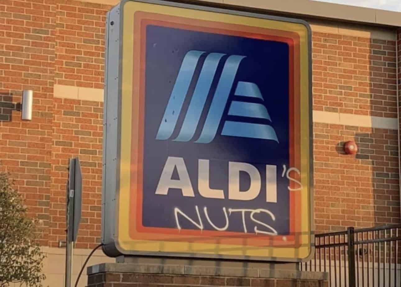mildly vandalized, mild vandalism, soft sabotage, gentle defacement, subtle tampering, funny graffiti, comedic street art, witty scribbles, humorous wall doodles, safe comedic stunts, playful mischief, minimal disruption, soft mischief, mild troublemaking, low-key meddling, gentle roguery