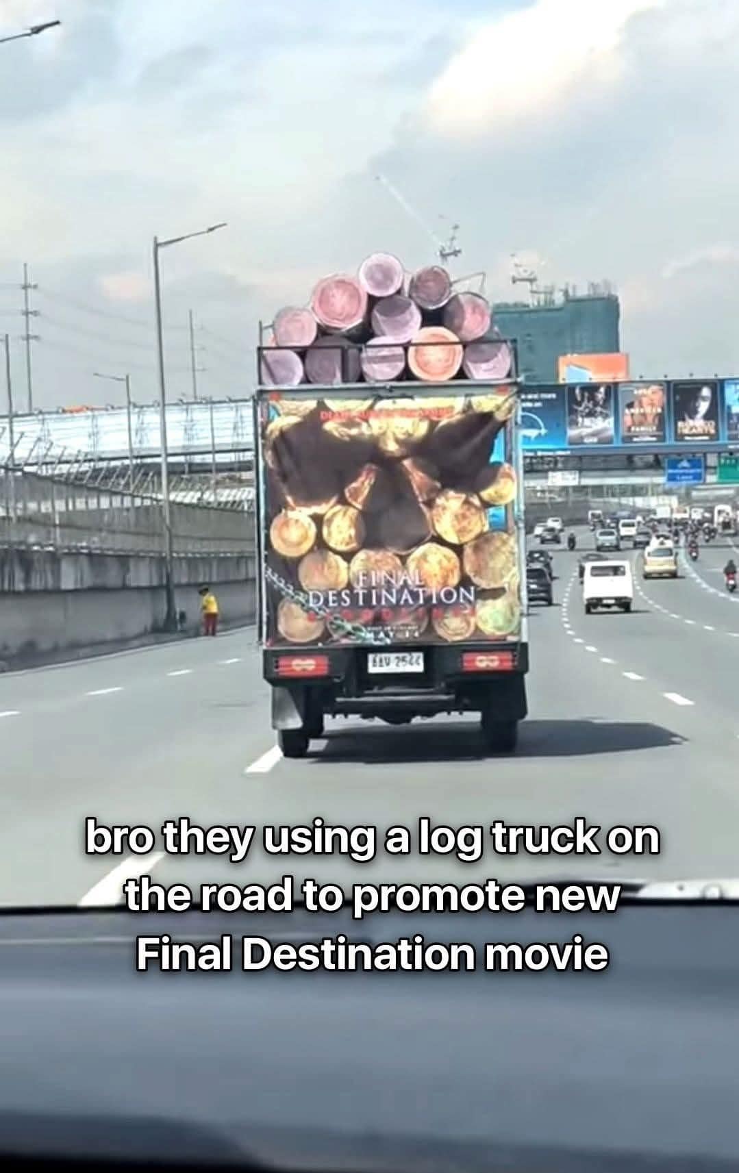 RDESTINATION EAv 2526 bro they using a log truck on the road to promote new Final Destination movie