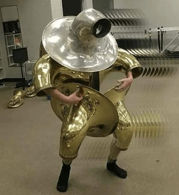 cursed instruments, instruments with threatening auras, weird instruments, instrument fails, bizarre music, odd instruments, performance art, music gadgets, funny instrument photos, experimental music, custom instruments, music humor, instrument design, odd musical gear, creepy instruments