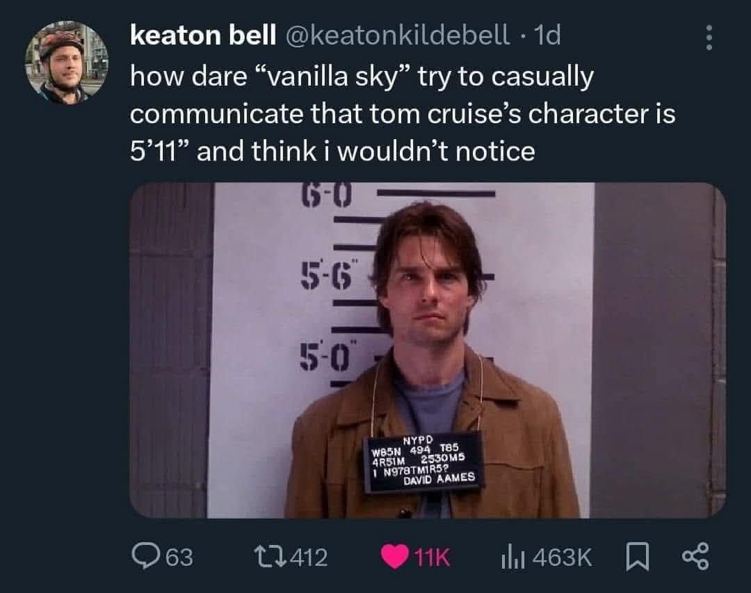 Tweet mocking Vanilla Sky mugshot scene implying character’s height 5'11 beside police measurement board.