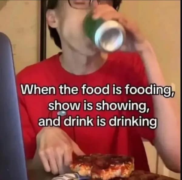 Guy in red shirt sipping soda with pizza, captioned “food is fooding” relatable meme