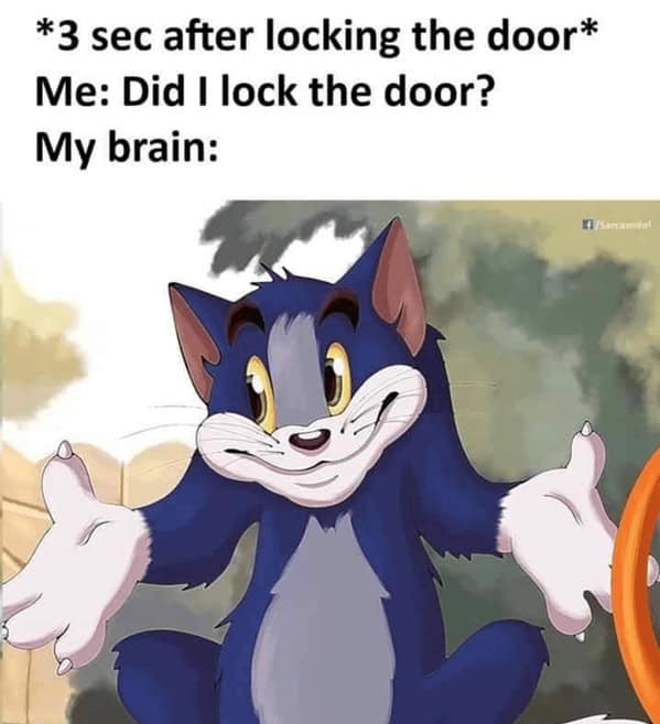 Tom the cat from Tom and Jerry shrugging awkwardly.