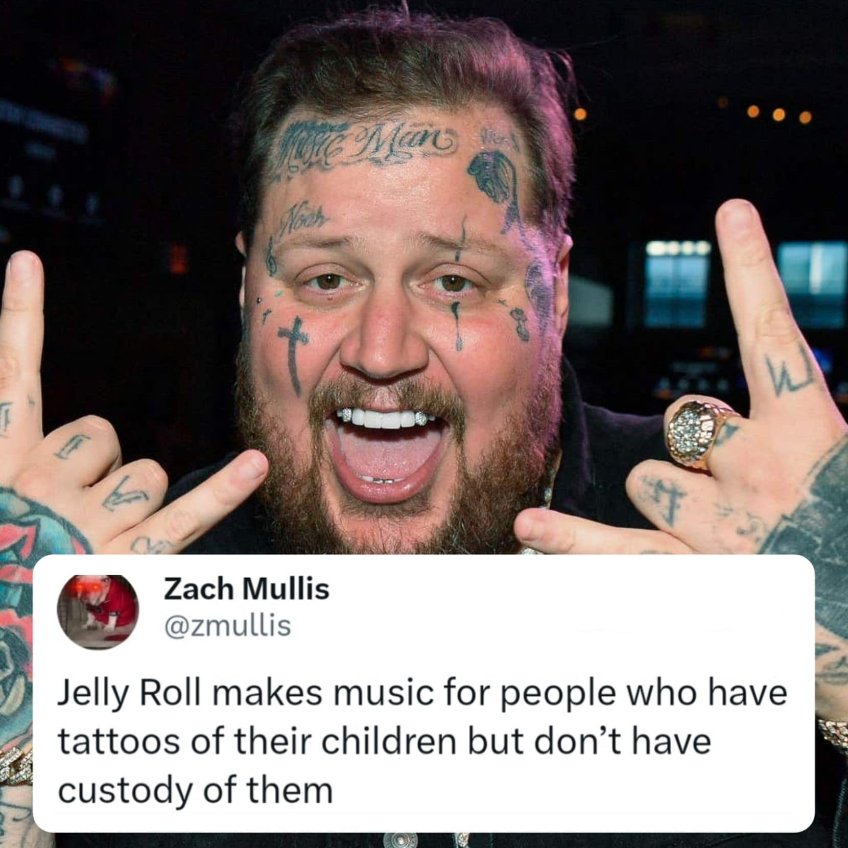 Tattooed, smiling man flashing rock-hand signs with an overlaid tweet joking about a musician named “Jelly Roll.”