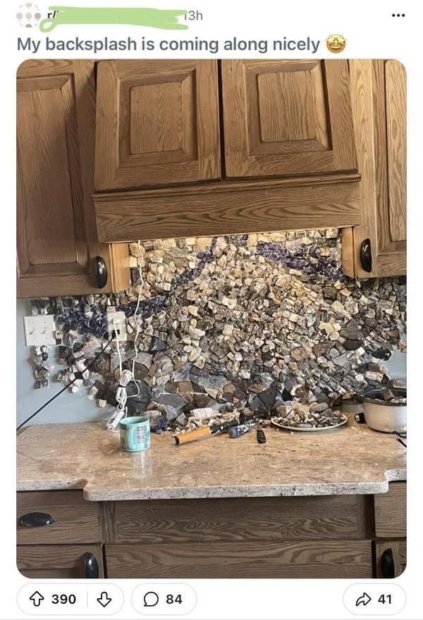 A kitchen renovation fail showing a disastrous attempt at a DIY rock backsplash.