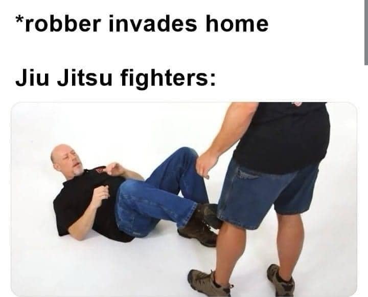 A funny Jiu Jitsu meme showing a fighter ready to grapple with a home invader on the ground.