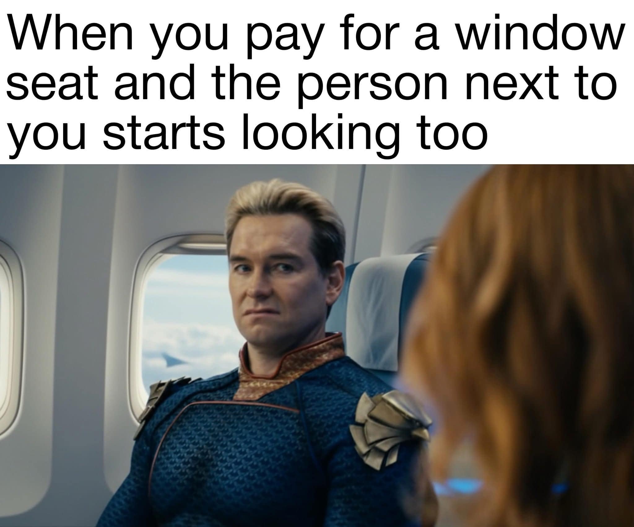 Homelander side-eyeing seatmate who’s also peeking out the airplane window.