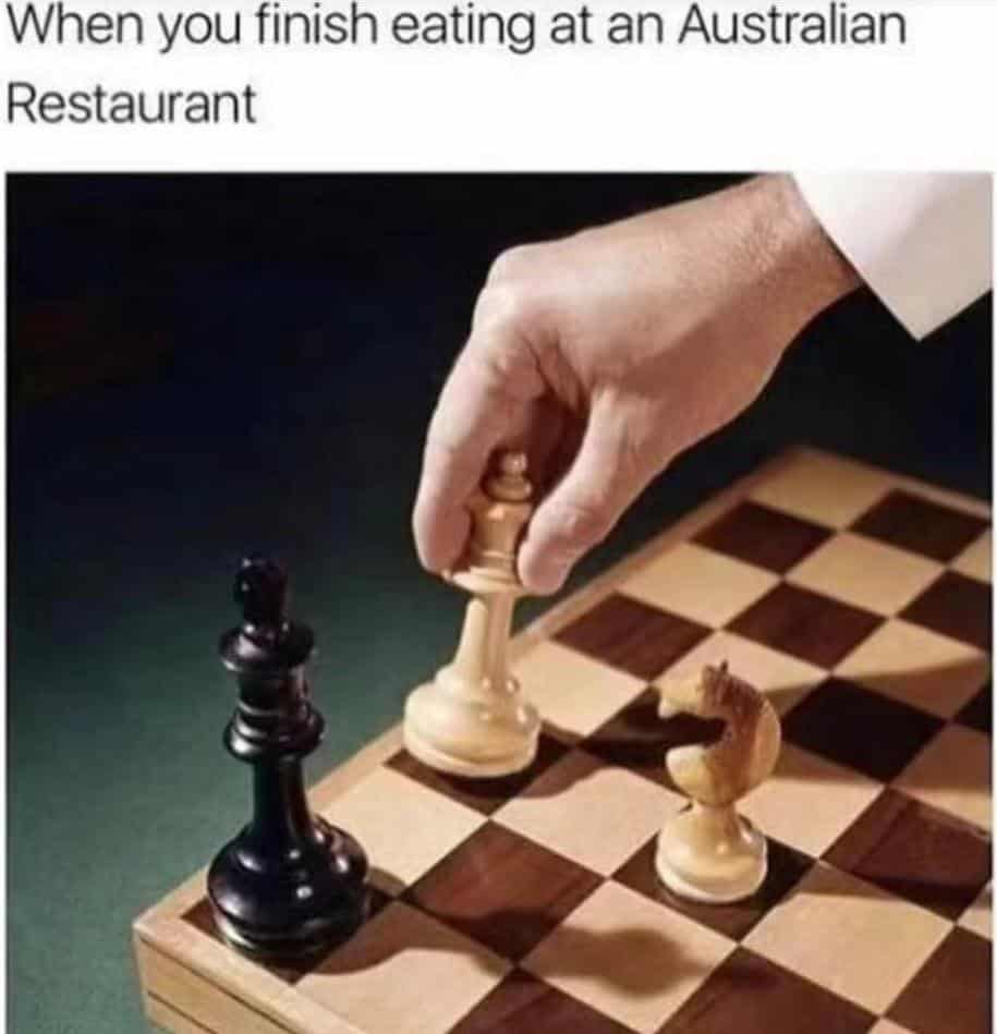 A pun meme using a chessboard in checkmate to represent finishing a meal at an Australian restaurant.