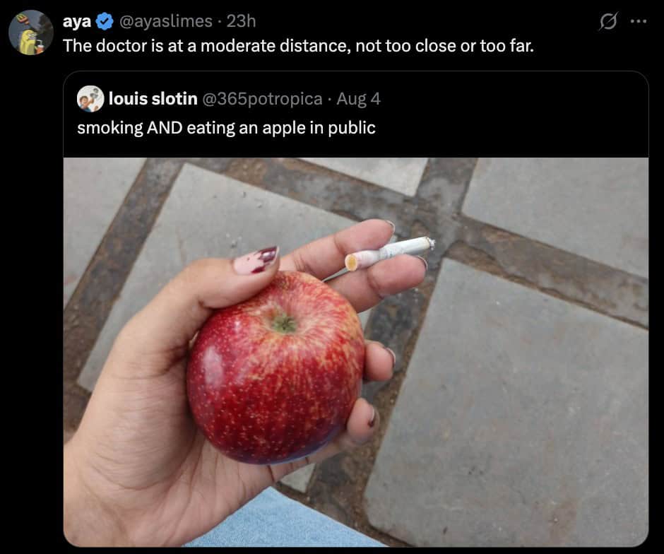 A funny internet comment reacting to a picture of someone smoking while eating an apple.