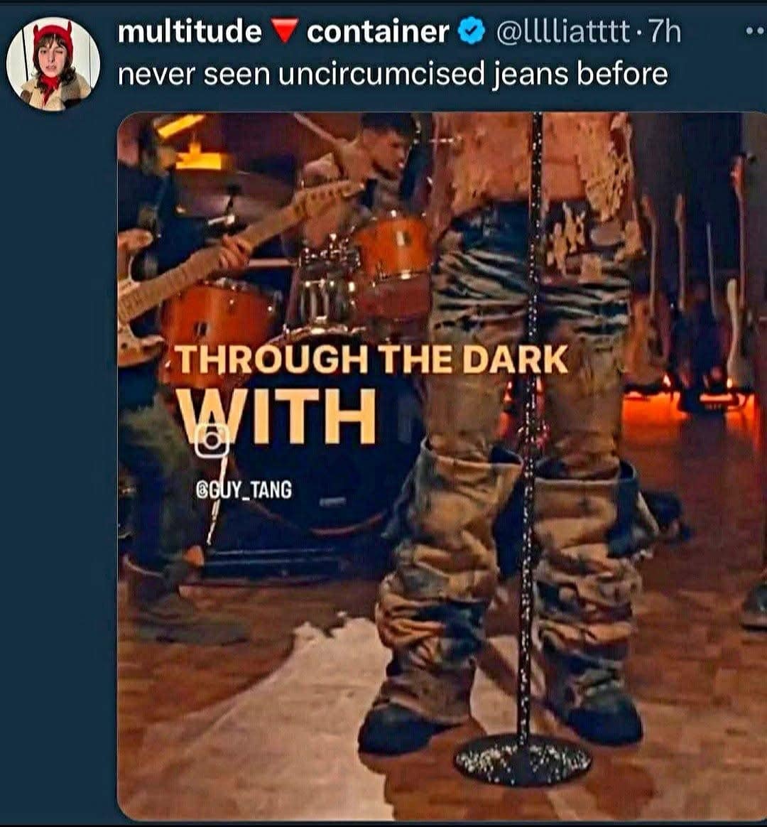 Funny tweet describing strangely bunched-up jeans worn by a musician on stage as "uncircumcised jeans."