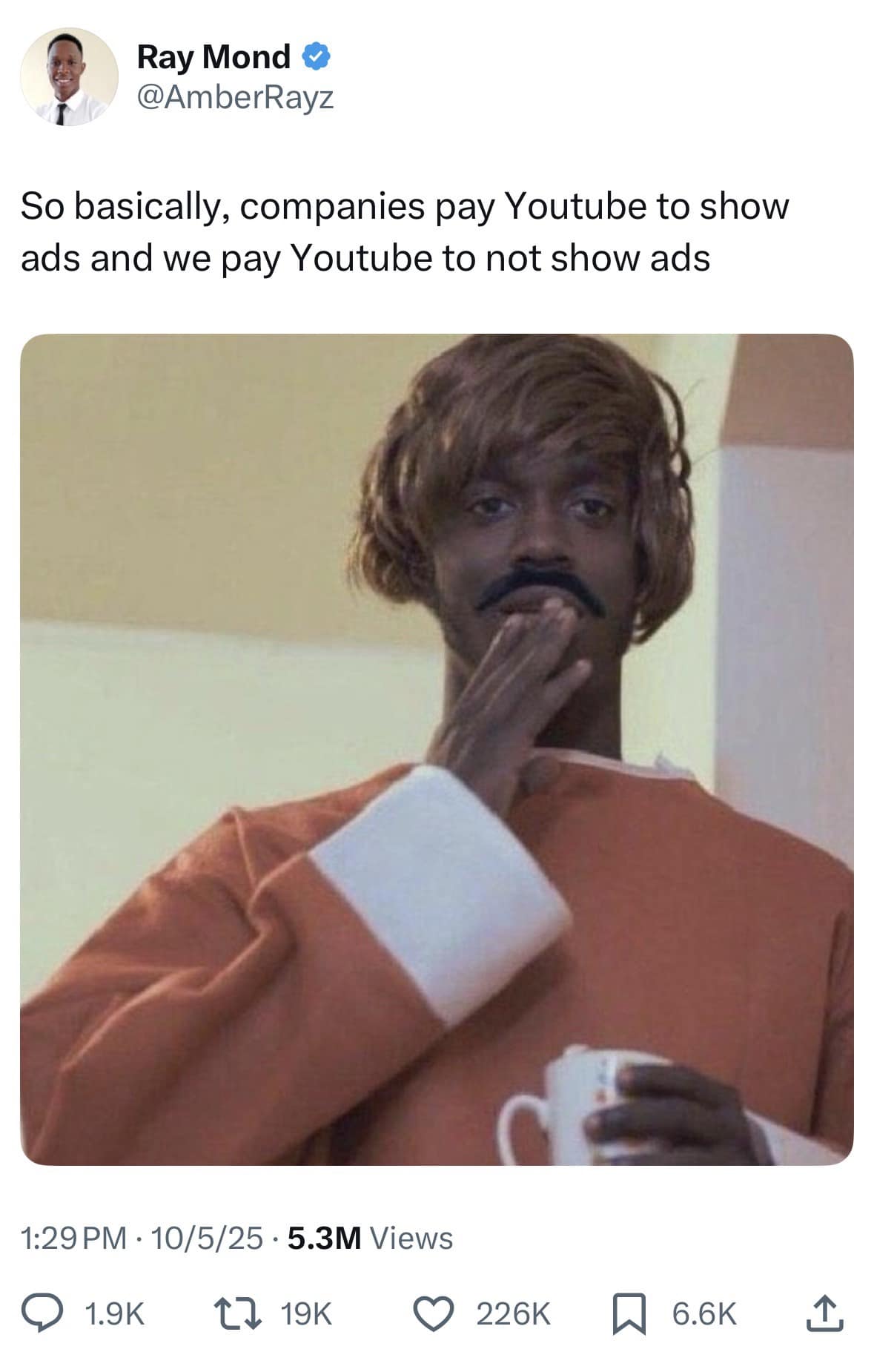 A funny meme with a Dave Chappelle reaction image explaining the YouTube Premium business model.