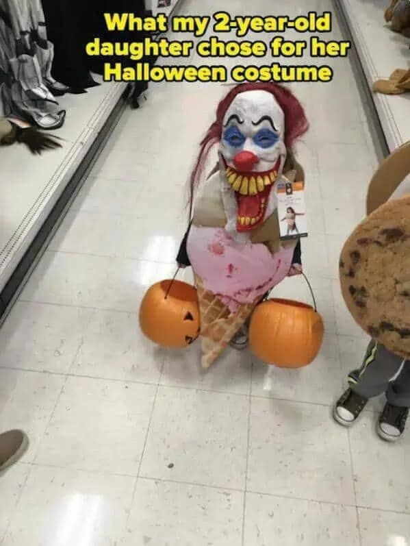 A hilarious meme showing a toddler who chose a terrifying killer clown ice cream cone Halloween costume.