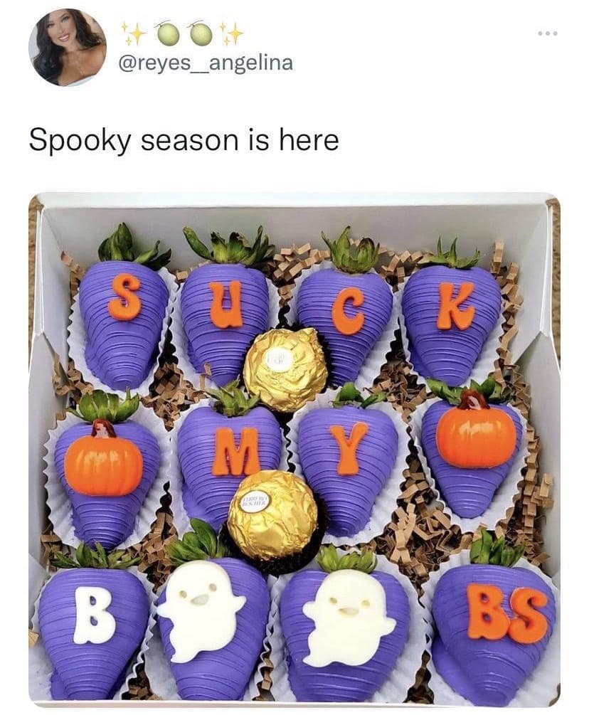 A Halloween meme dump post showing chocolate strawberries decorated with a rude message for spooky season.