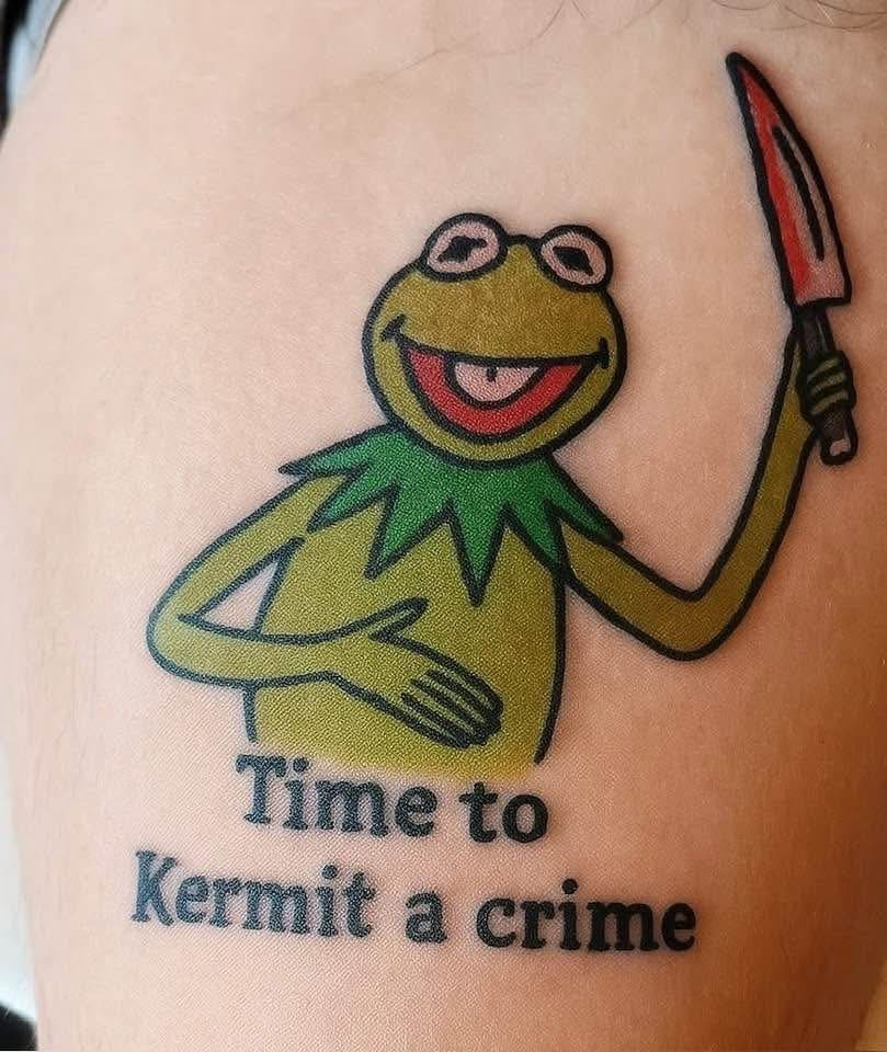 Tattoo of Kermit the Frog holding a knife saying Time to Kermit a crime.
