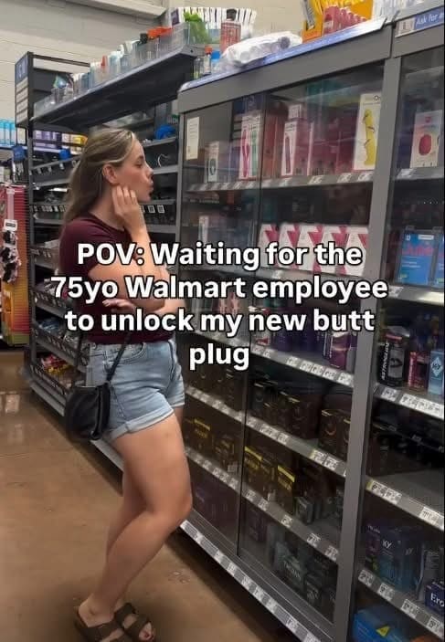 Woman waiting awkwardly in a store aisle with a caption about adult products.