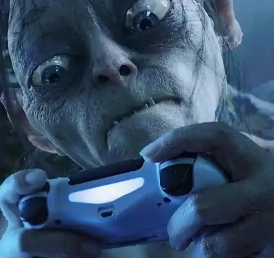 A lotr meme depicting Gollum intensely gripping a PlayStation controller, looking exactly like a gamer obsessing over their "precious" console.