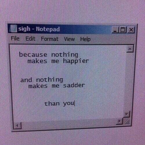 Windows Notepad with text about being happy and sad on an old computer screen.