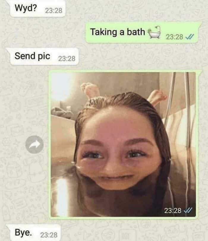 A bathtub selfie with a face-distorting filter that makes the person look like a wide-eyed creature.