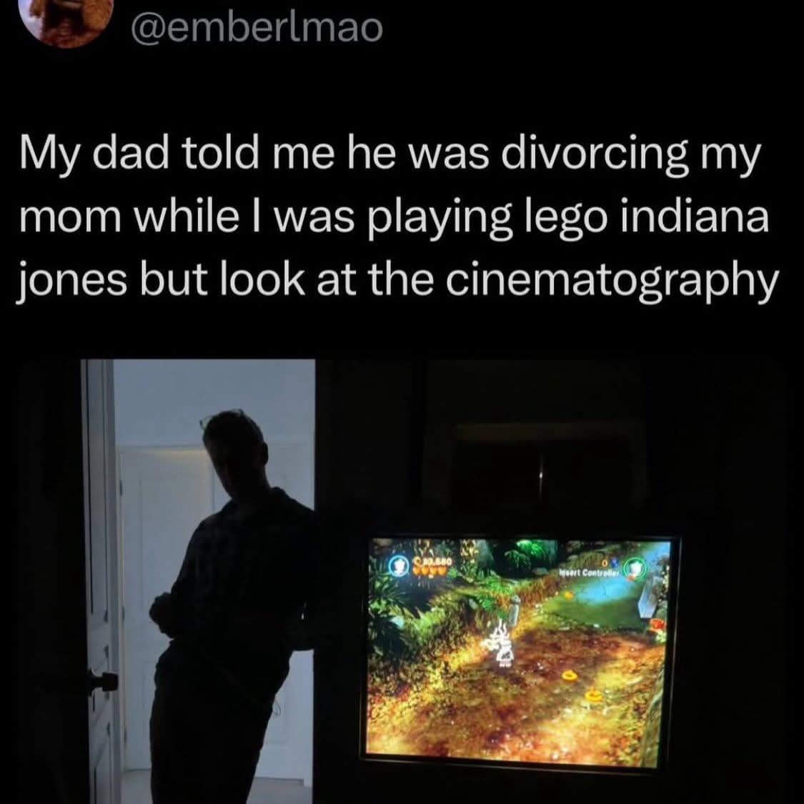 dramatic childhood funny meme showing a dark room illuminated only by a TV screen playing Lego Indiana Jones, with the silhouette of a dad leaning against the doorframe, perfectly capturing the cinematic gravity of a divorce announcement.