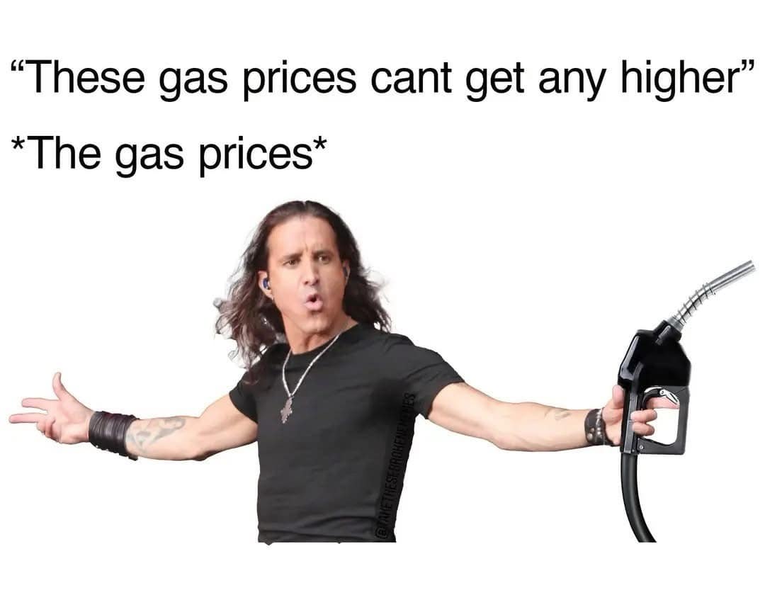 A musical pun funny meme featuring Scott Stapp from Creed with his arms spread wide in his iconic pose, but he's holding a gas station nozzle. The text mocks inflation: "'These gas prices cant get any higher' The gas prices," referencing the hit song "Higher."