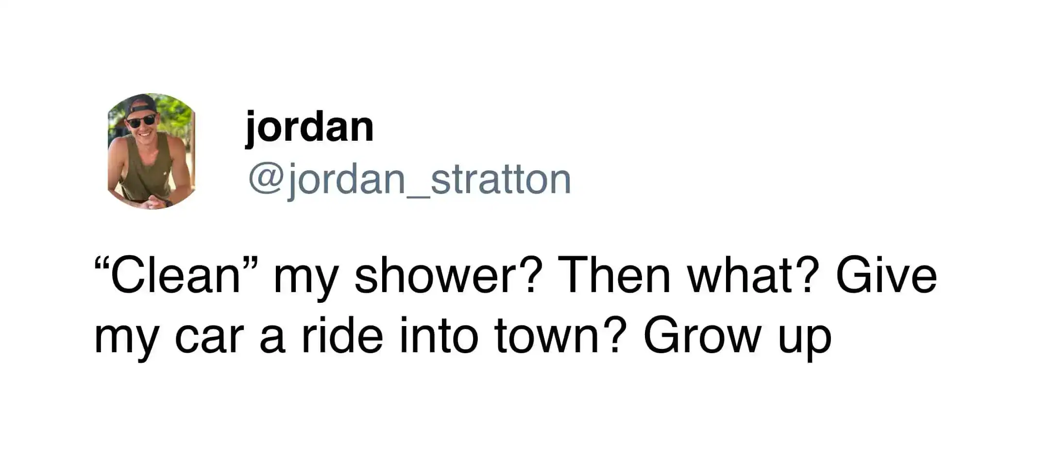 A humorous tweet questioning the logic of cleaning a shower using a car ride analogy.