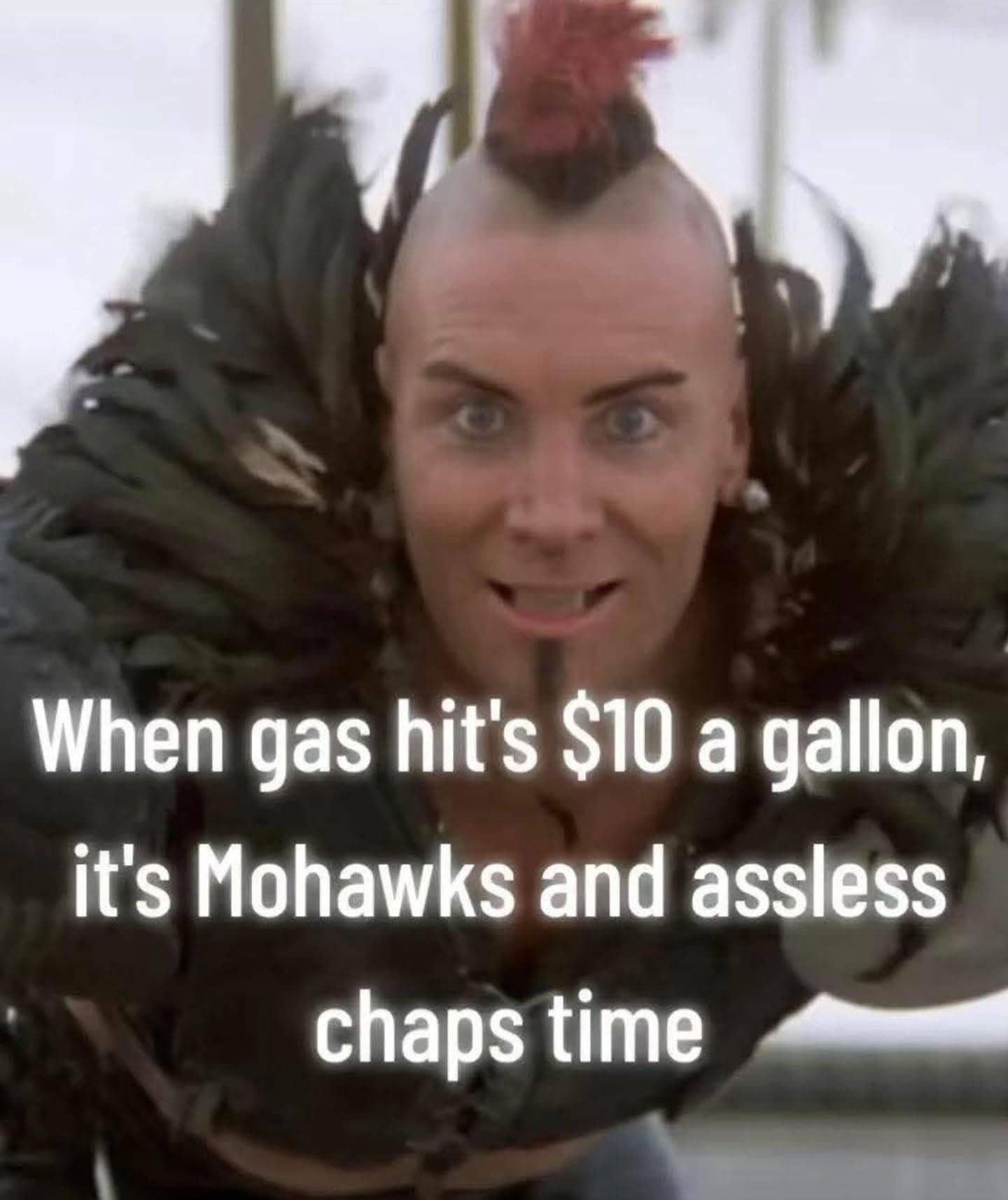 Mad Max style character with a mohawk meme about gas prices hitting ten dollars a gallon.