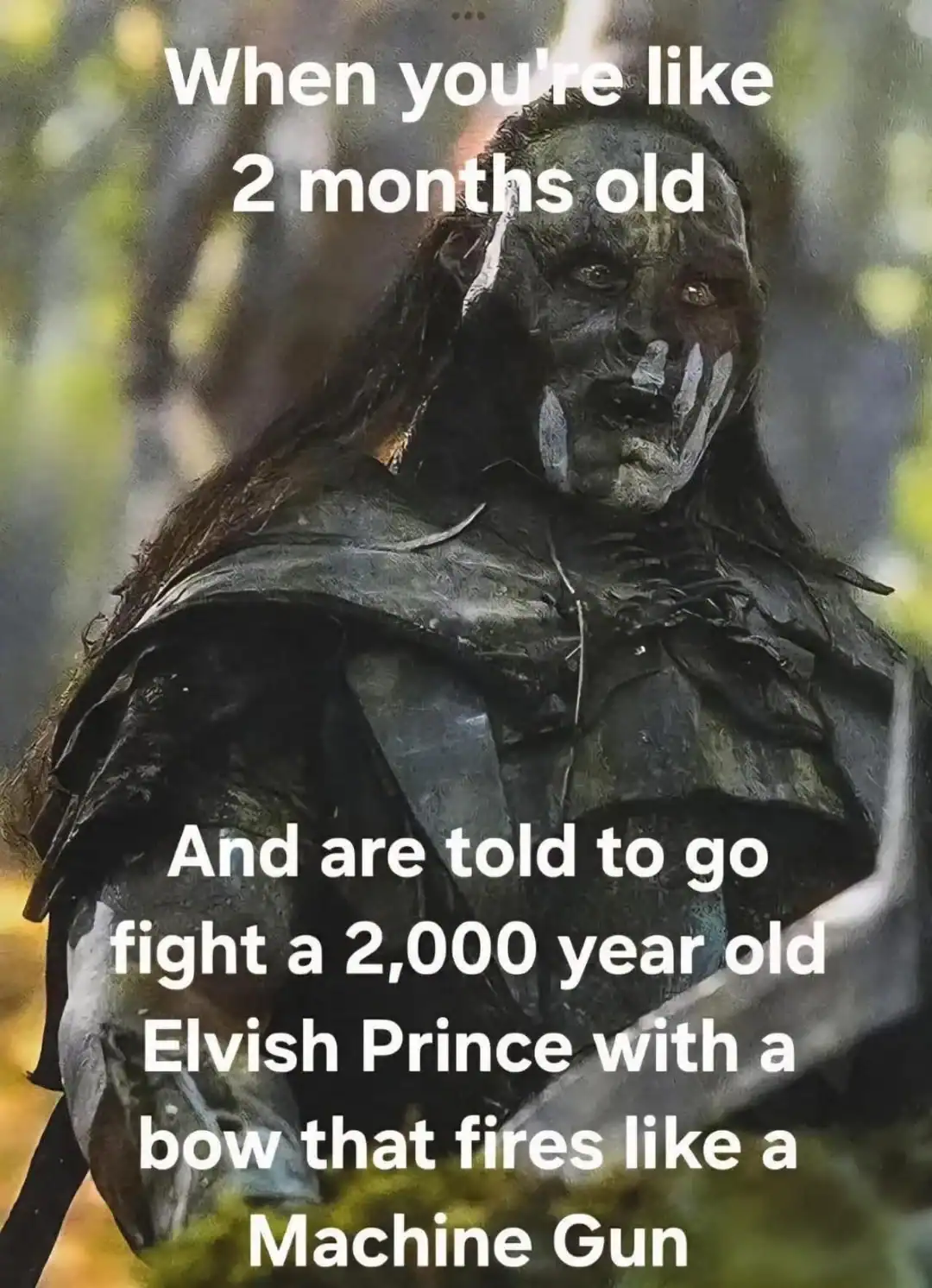 gritty lotr meme featuring a battle-worn Uruk-hai. The text humorously highlights the unfair power scaling in Middle-earth: "When you're like 2 months old and are told to go fight a 2,000 year old Elvish Prince with a bow that fires like a Machine Gun."