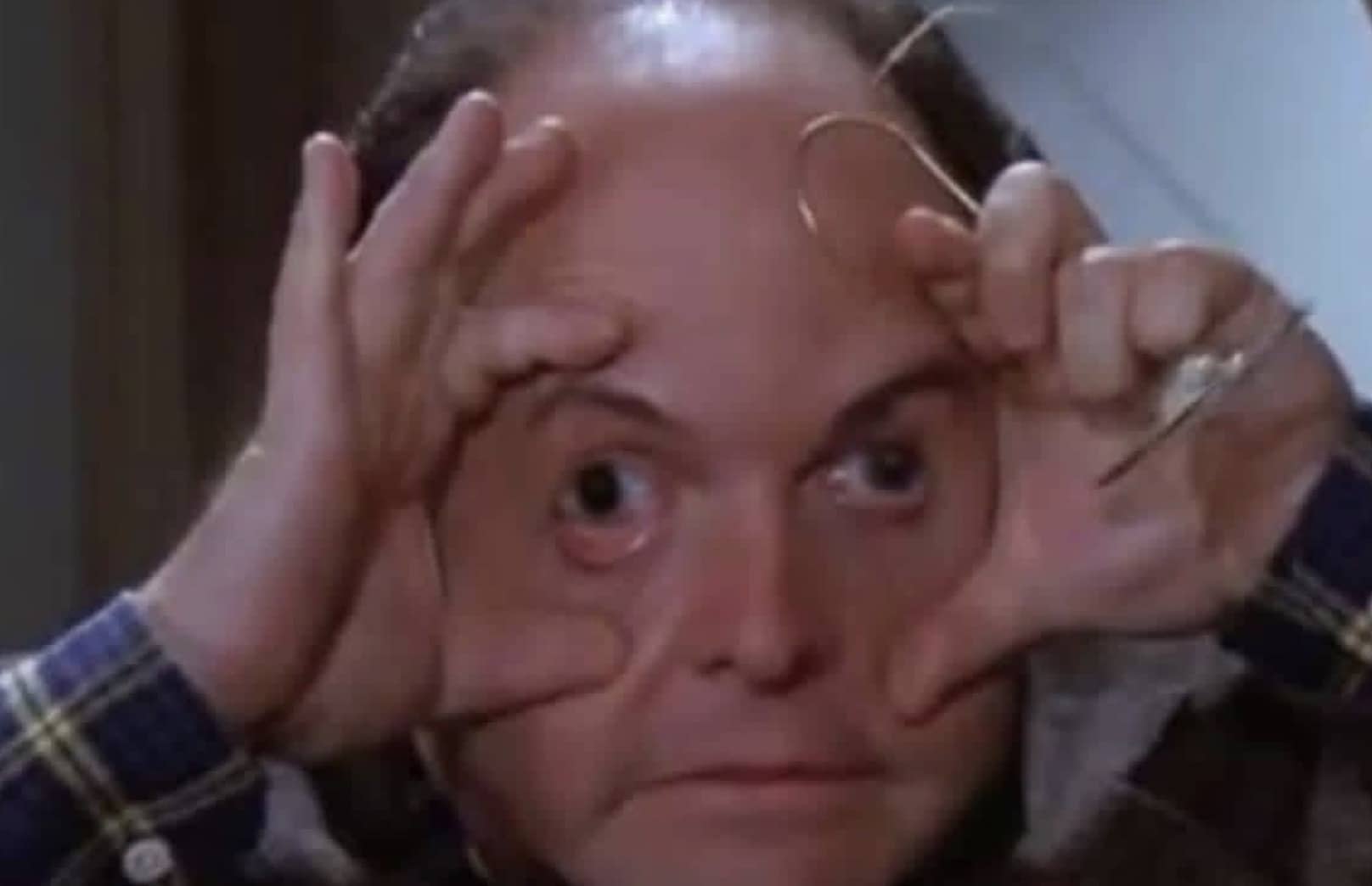 George Costanza from Seinfeld holding his eyes wide open with fingers funny meme.