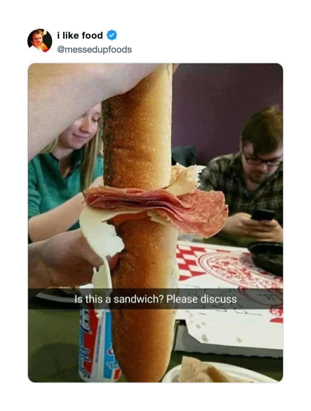 Funny meme showing a baguette cut lengthwise asking if vertical bread makes a sandwich.