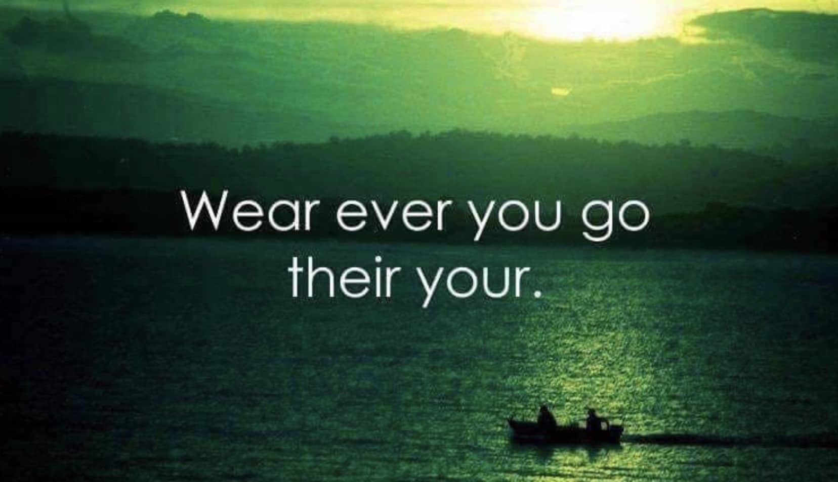 Funny meme of mispelled motivational quote over sunset landscape with silhouettes boating on water.