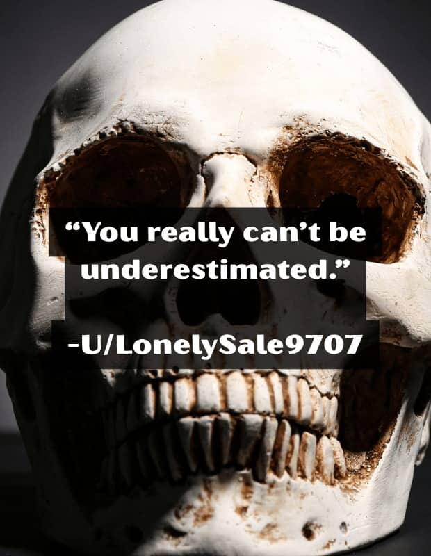 Weathered human skull behind a quote reading you really can't be underestimated