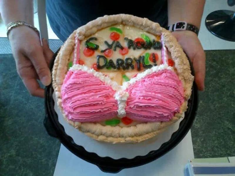 Pink bra themed goodbye cake with see ya round Darryl written on top