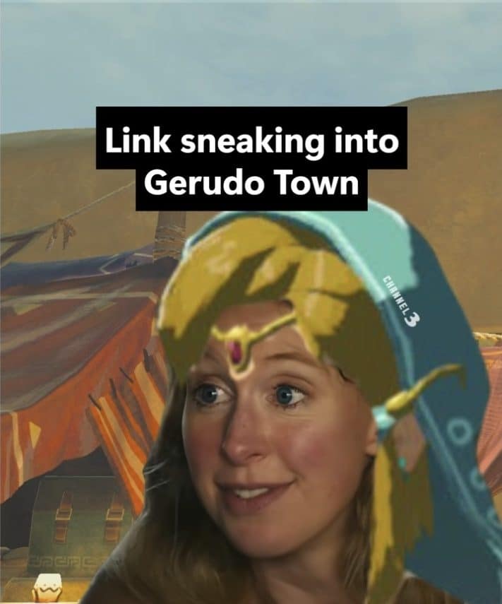 Meme dump shot of a woman in a Link disguise sneaking into Gerudo Town.