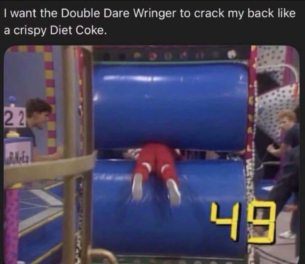 Double Dare contestant squeezed through the Wringer obstacle, with a tweet about cracking backs.