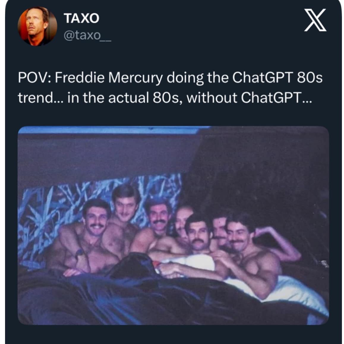 Authentic 1980s photograph of Freddie Mercury lounging in bed surrounded by mustache-wearing friends in a funny meme.