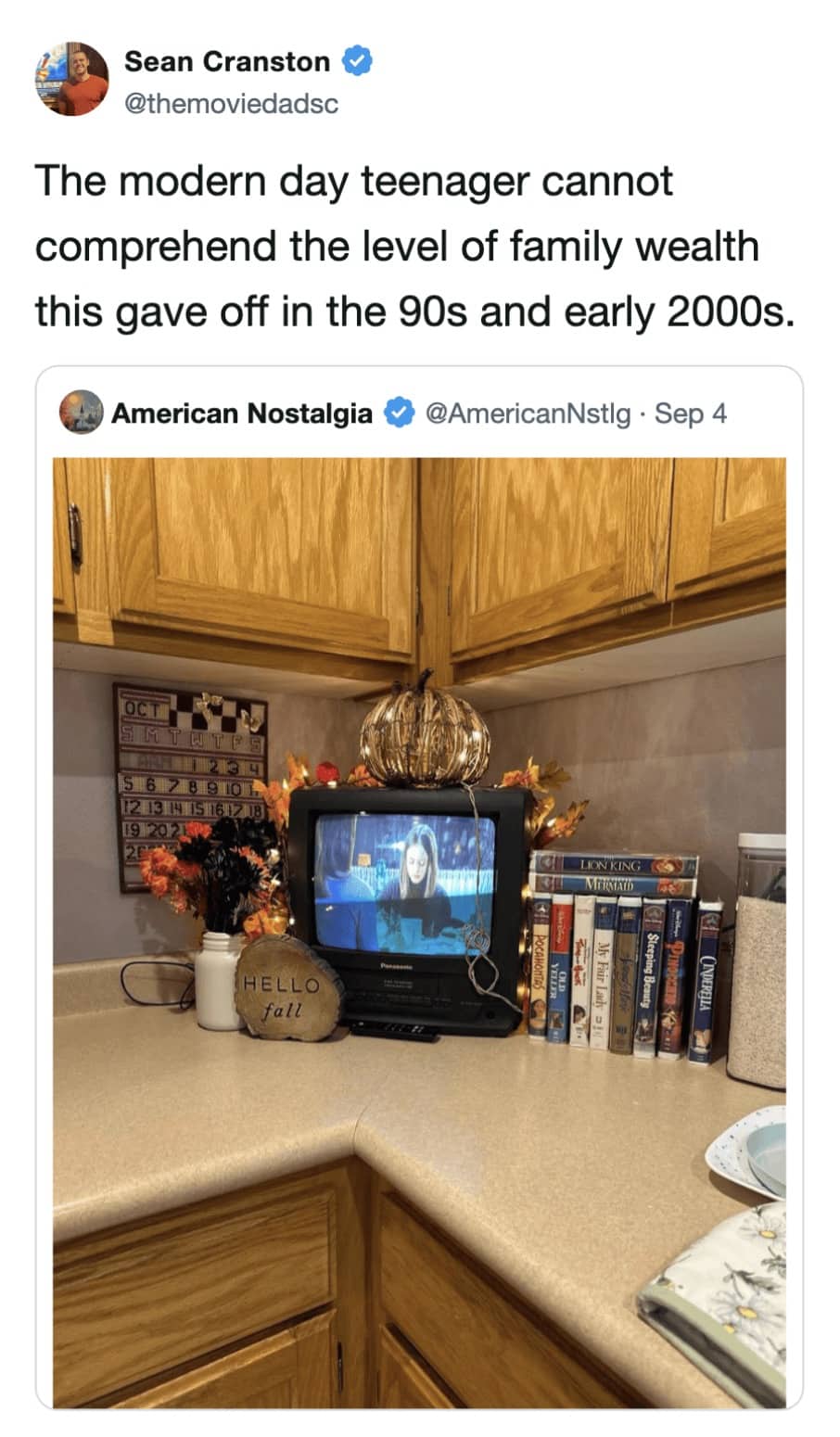 Memes photo of a small kitchen CRT TV setup representing peak nineties family wealth.