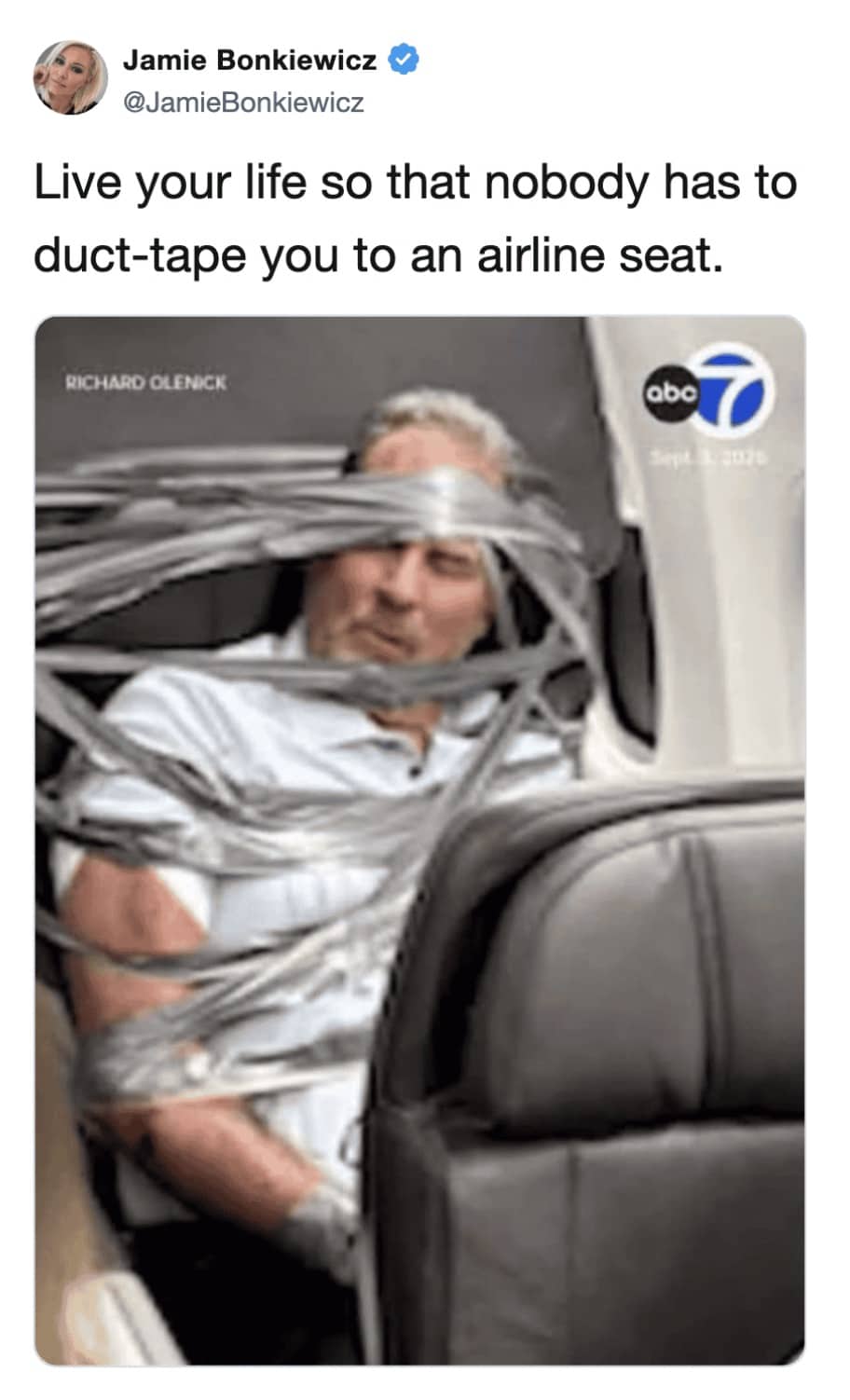 Memes news image of an unruly airplane passenger duct taped securely to seat.