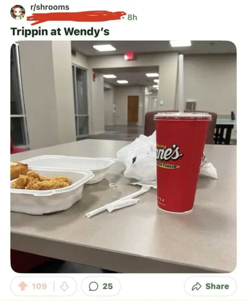Chicken finger meal and a red cup on a table, mislabeled as a Wendy's visit