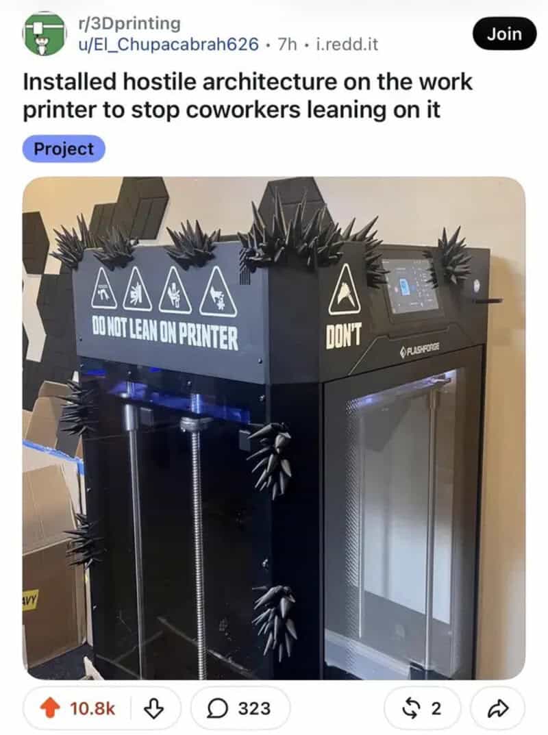 Office 3D printer covered in black spikes to stop coworkers from leaning on it