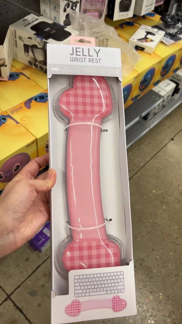Pink gingham jelly wrist rest shaped like a bone, an example of awful taste but great execution
