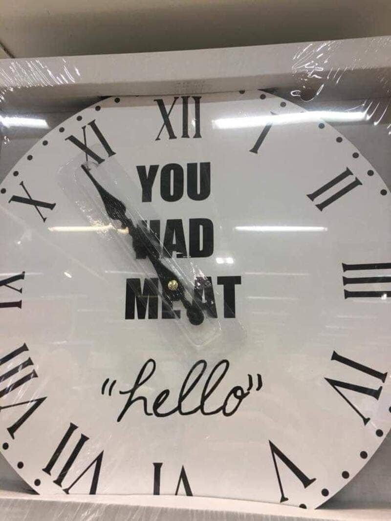 Clock reading You had me at hello, with its hands covering letters so it says meat
