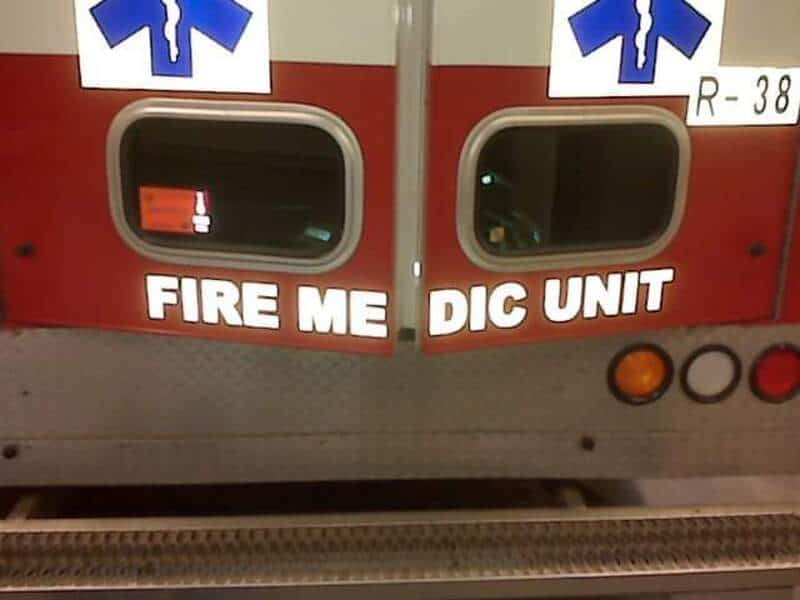 Ambulance doors splitting the words Fire Medic Unit so they read Fire Me Dic Unit