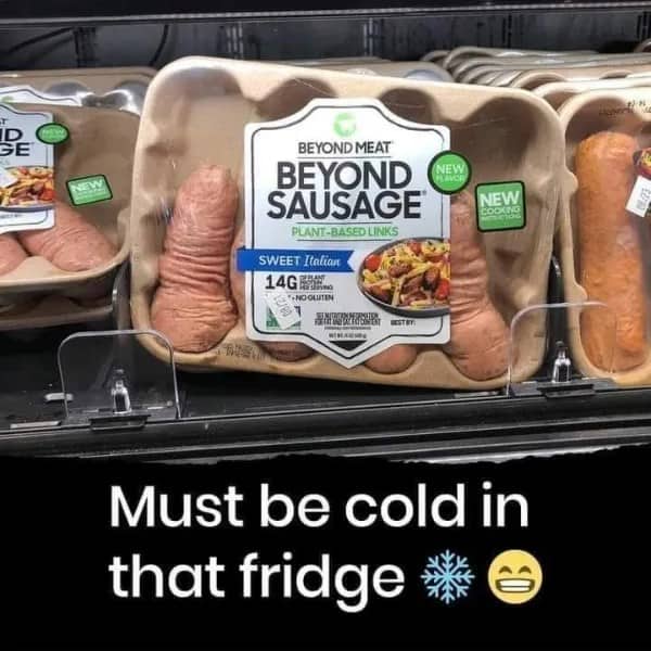 Plant based sausage package in a grocery fridge with oddly shaped links and a joke caption