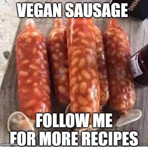 Clear casings stuffed with baked beans and tied off to look like sausages, labeled vegan sausage.