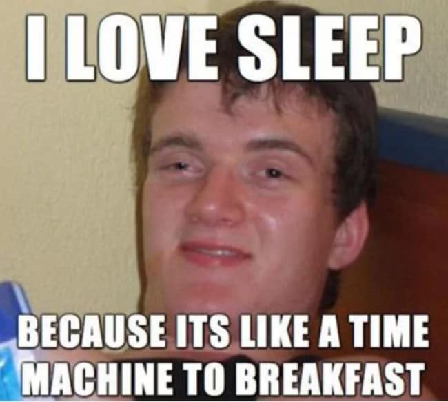 Wide-eyed young man meme calling sleep a time machine that skips straight to breakfast.