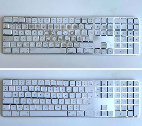 White keyboard covered in grimy smudges around the keys, cleaned until every key is spotless.