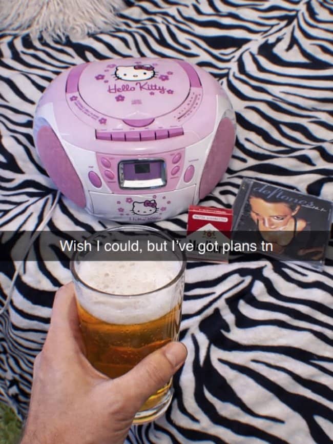 Hand holding a beer beside a Hello Kitty boombox and a Deftones CD, captioned plans tonight.