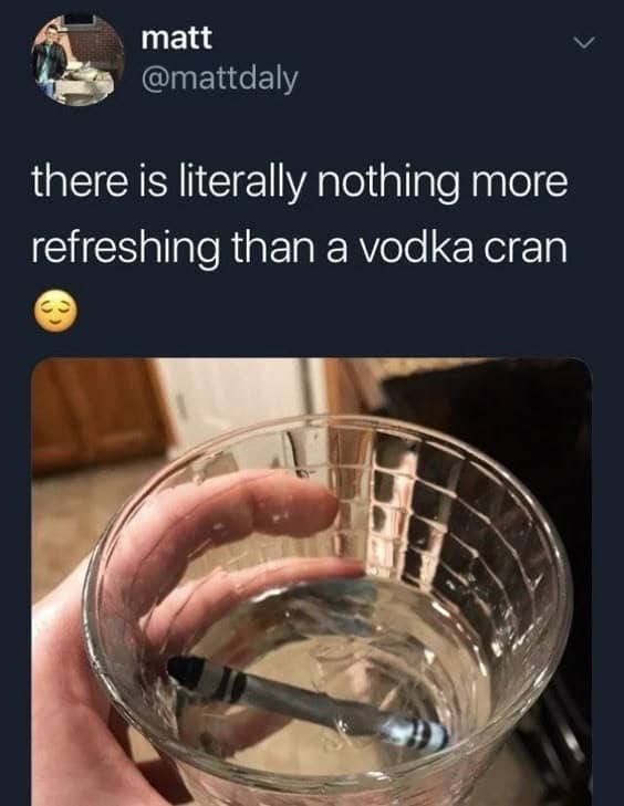 Glass of clear vodka with a crayon floating inside, presented as a vodka cran on Twitter.