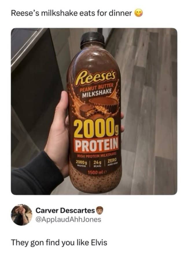 Hand holding a Reese's peanut butter milkshake labeled 2000g protein, with a reply about Elvis.